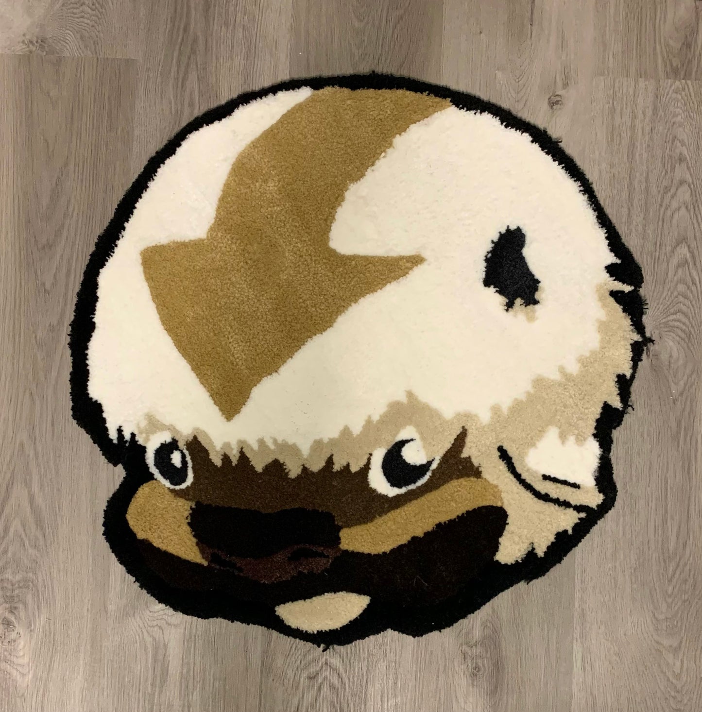 Custom-made tufted rug featuring a Avatar The Last Airbender, Appa design. Handcrafted with love, this unique piece adds a playful touch to any space.